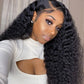 Woman with long, wavy black hair wearing a white top.